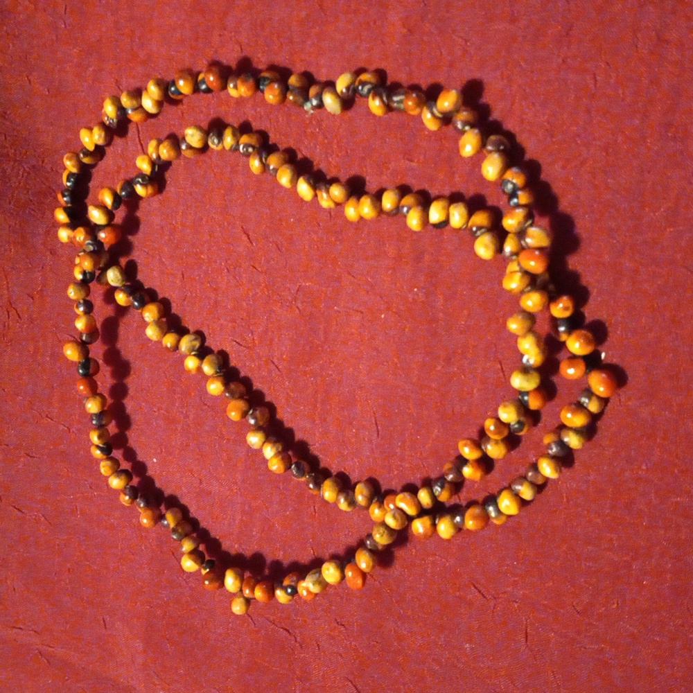 Navajo hand strung cedar seed necklace. 26"